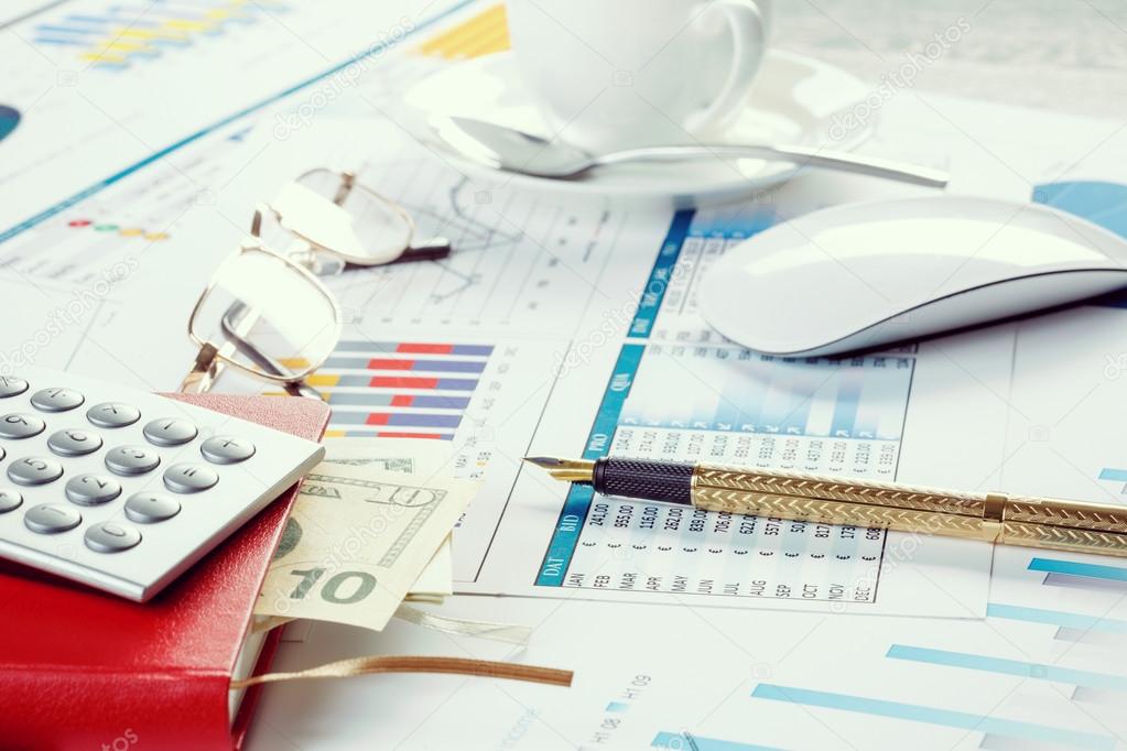 depositphotos_101920596-stock-photo-financial-charts-and-graphs-on