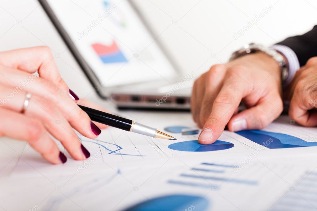 depositphotos_22622499-stock-photo-business-discussing-during-a-meeting